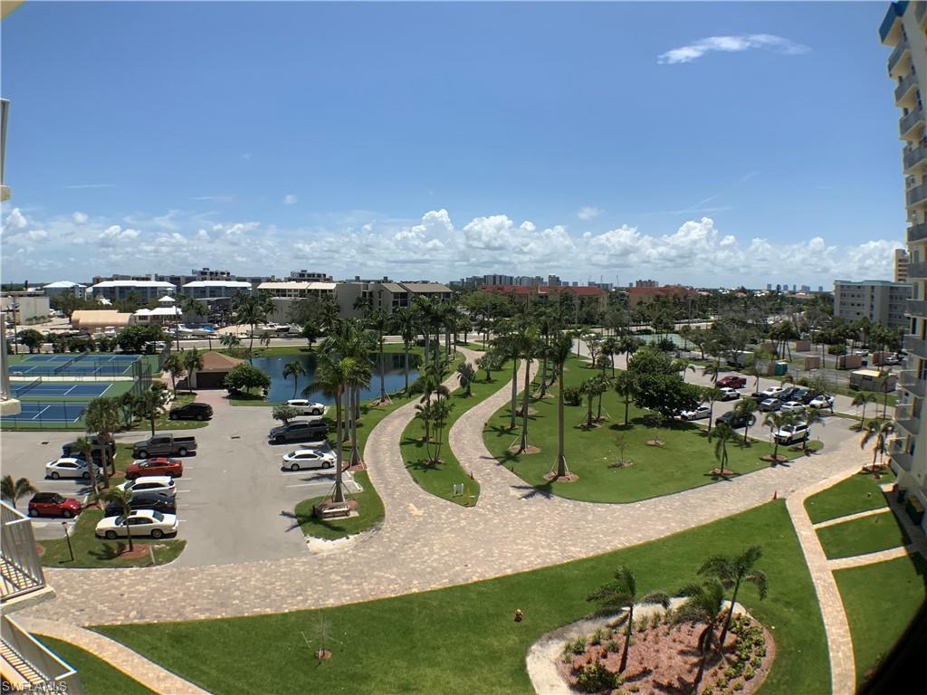 Tennis, pickle ball and pond area, Drive way