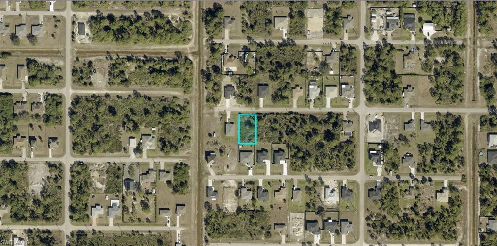 Aerial Map. Displaying the property within its surrounding street grid and land parcels