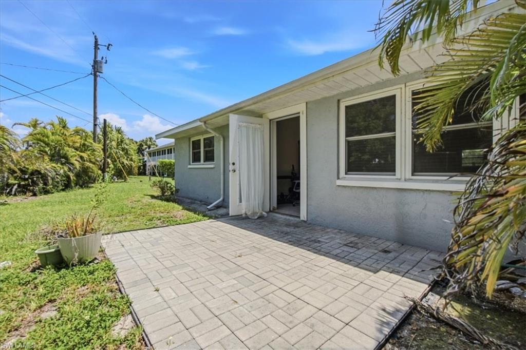 Living room door leads to patio