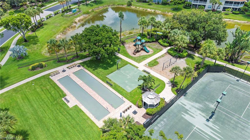 Community recreation area featuring tennis courts, bocce ball courts, a children's playground, and a gazebo