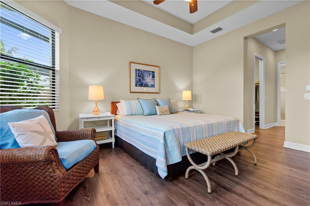 Primary ensuite with dual walk-in closets