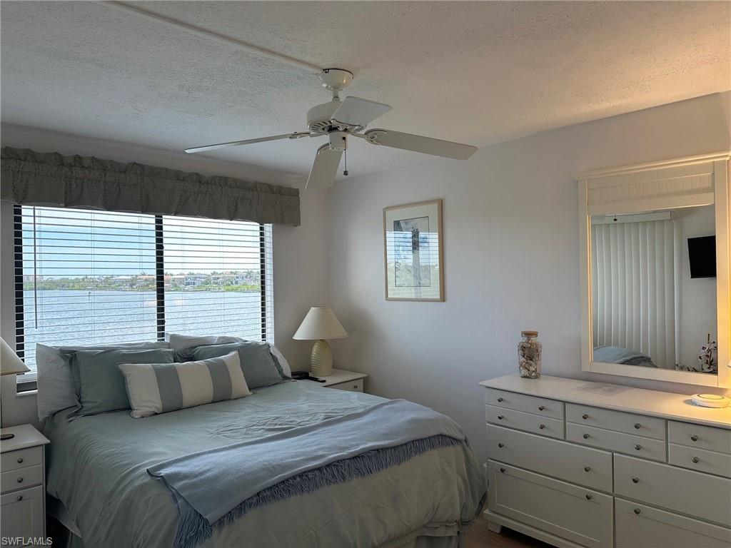 Expansive windows offer a water backdrop