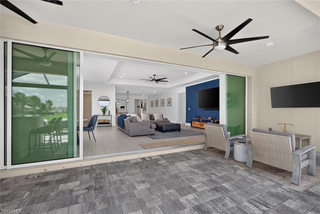 expansive oversized patio with pocket doors overlooking the great room