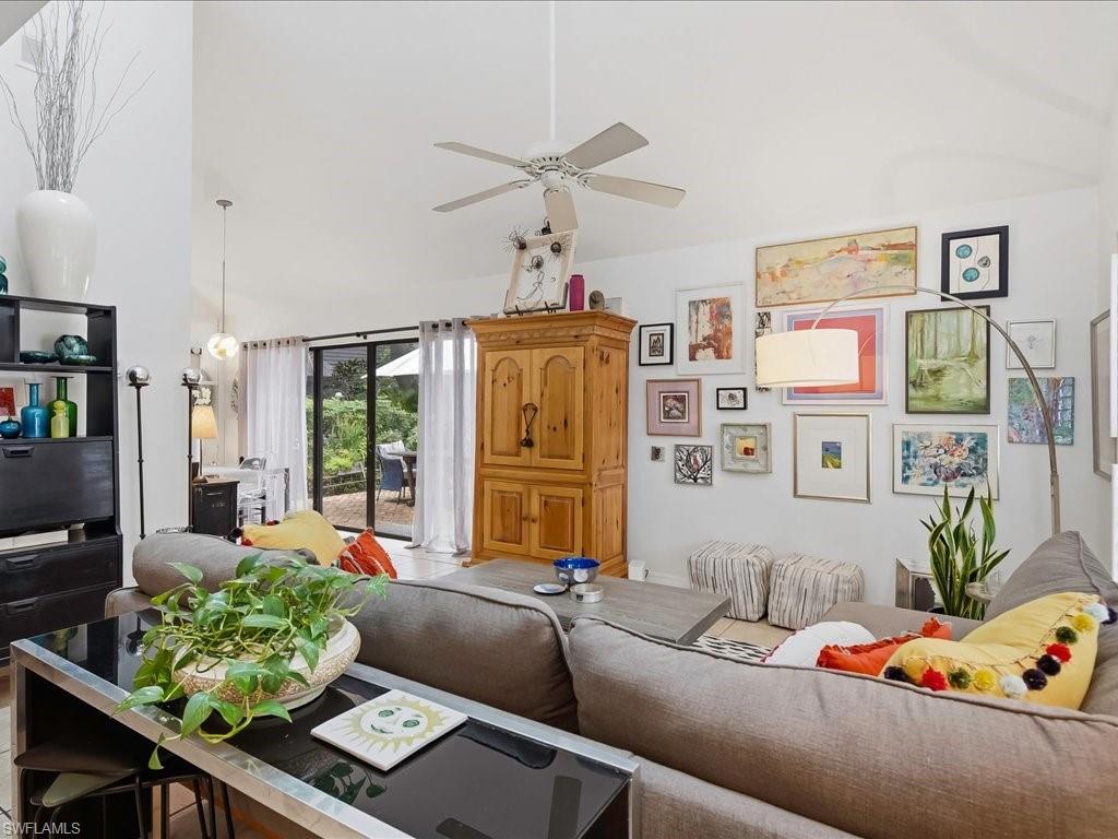 Vaulted ceilings with a ceiling fan and recessed lighting