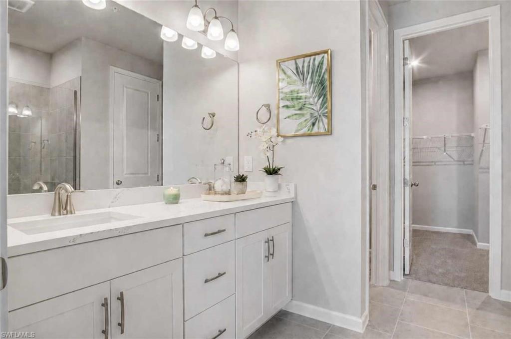 Photo includes reality staging to showcase the possibility of the primary bathroom. Design services included with purchase!