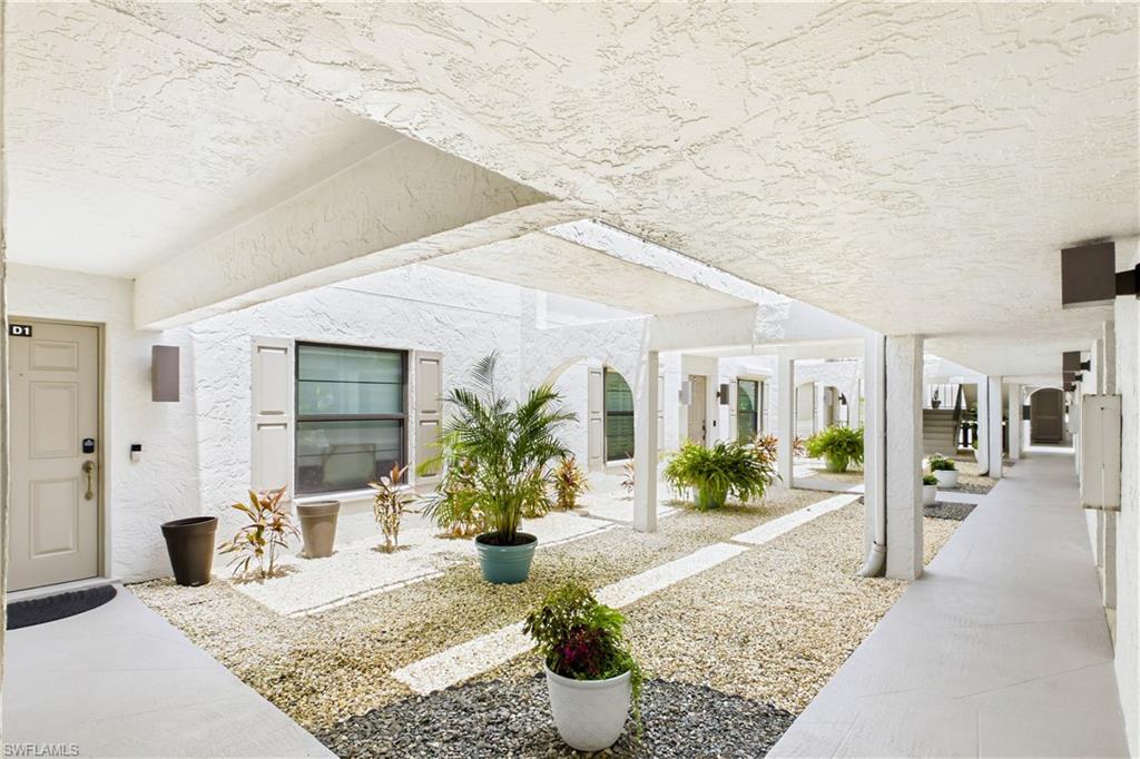 Covered walkway leading to the private second-floor entrance