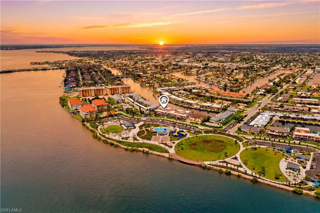SECOND-FLOOR WATERFRONT CONDO with DIRECT GULF ACCESS & STUNNING WIDE CANAL VIEWS in SE Cape Coral!