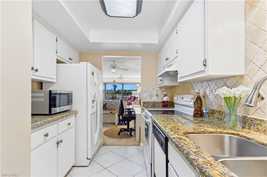 Open sightlines connect the kitchen to the dining area and living space