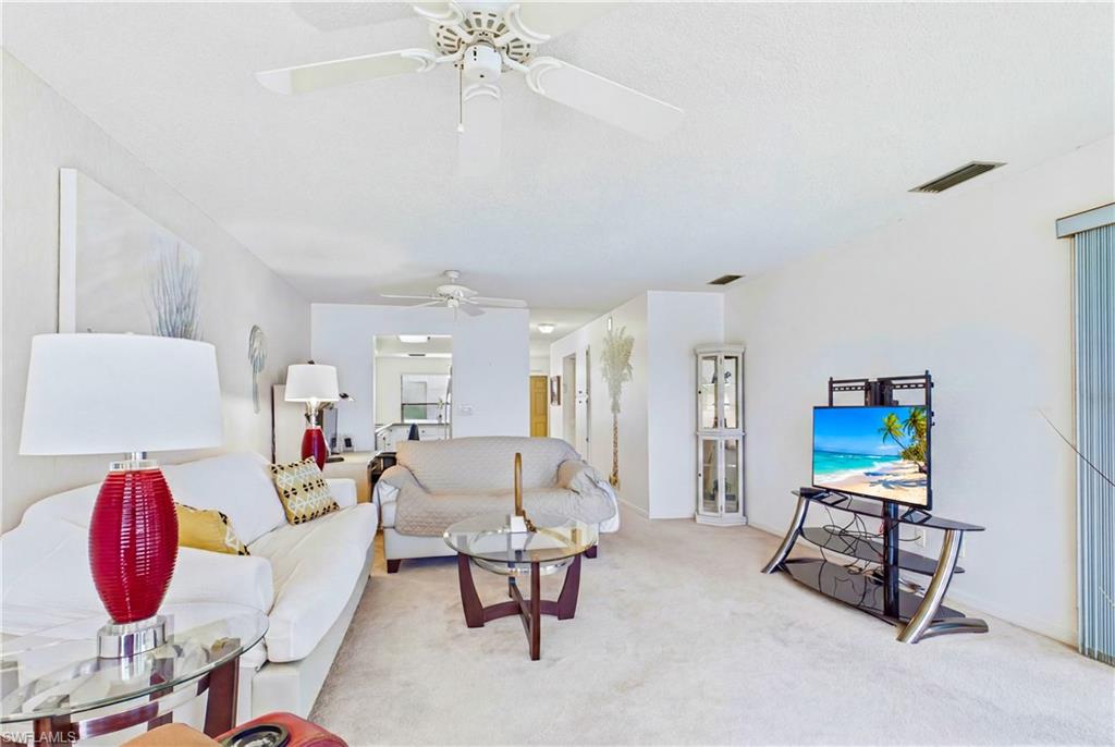 The spacious living room offers a bright, comfortable setting for everyday relaxation and entertaining