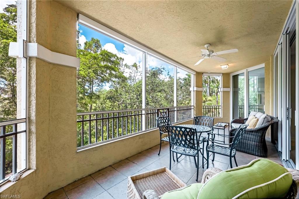 Sunroom with ceiling fan and a healthy amount of sunlight