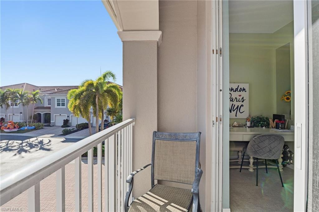 Front balcony off of bedroom. Chairs belong to current tenant.
