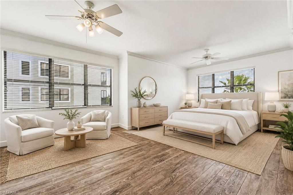 The expansive primary suite offers an impressive sense of scale, easily accommodating a refined sitting area. Bathed in natural light, this serene retreat showcases breathtaking river views, creating an atmosphere of effortless luxury and tranquility.Virtually Staged primary bedroom