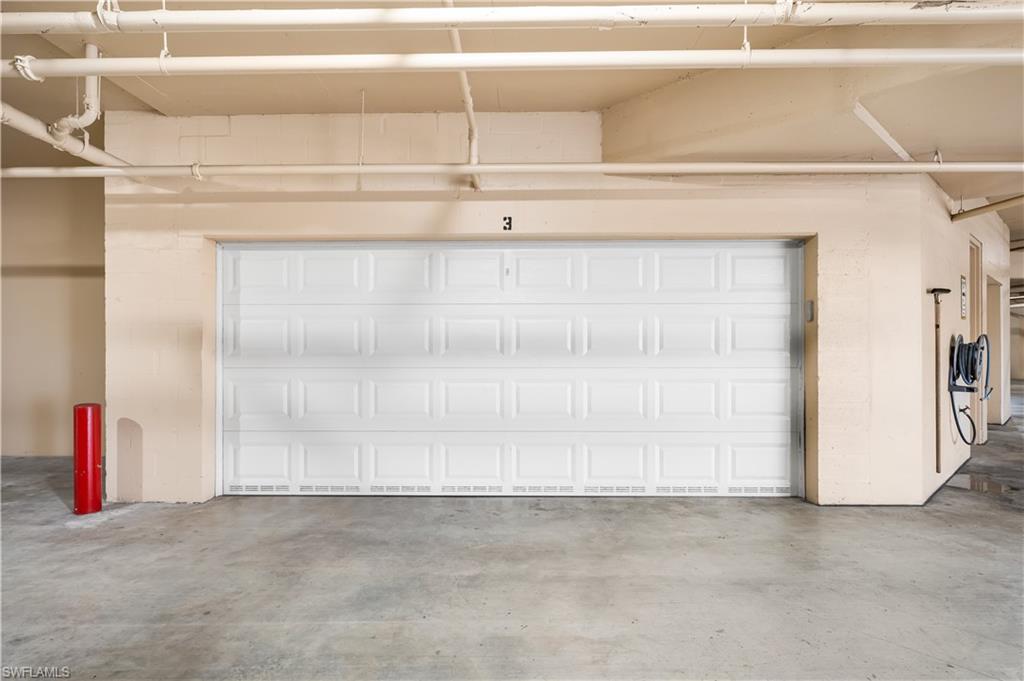 Large 2 car underbuilding enclosed garage.
