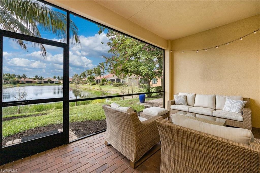 Sunroom with a water view
