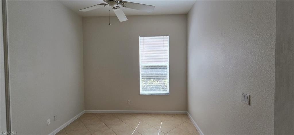Third Bedroom featuring light tile floor, and a ceiling fan