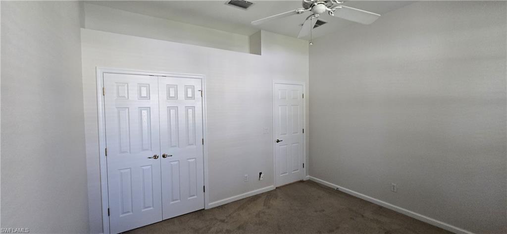 Second Bedroom Featuring Ceiling Fan, & A Generous Closet