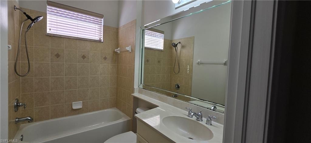 Second Full Bathroom Featuring Vanity, Tub /Shower Combination