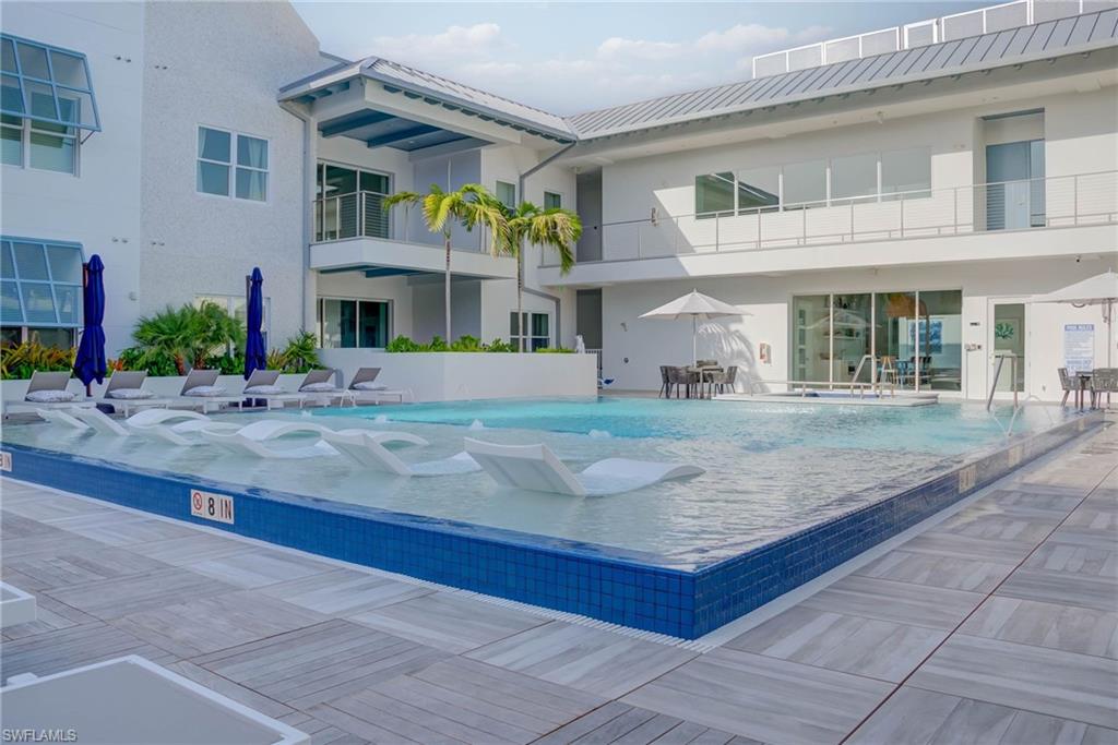 Pool and hit tub on the 2nd floor amenity deck just steps from the unit patio