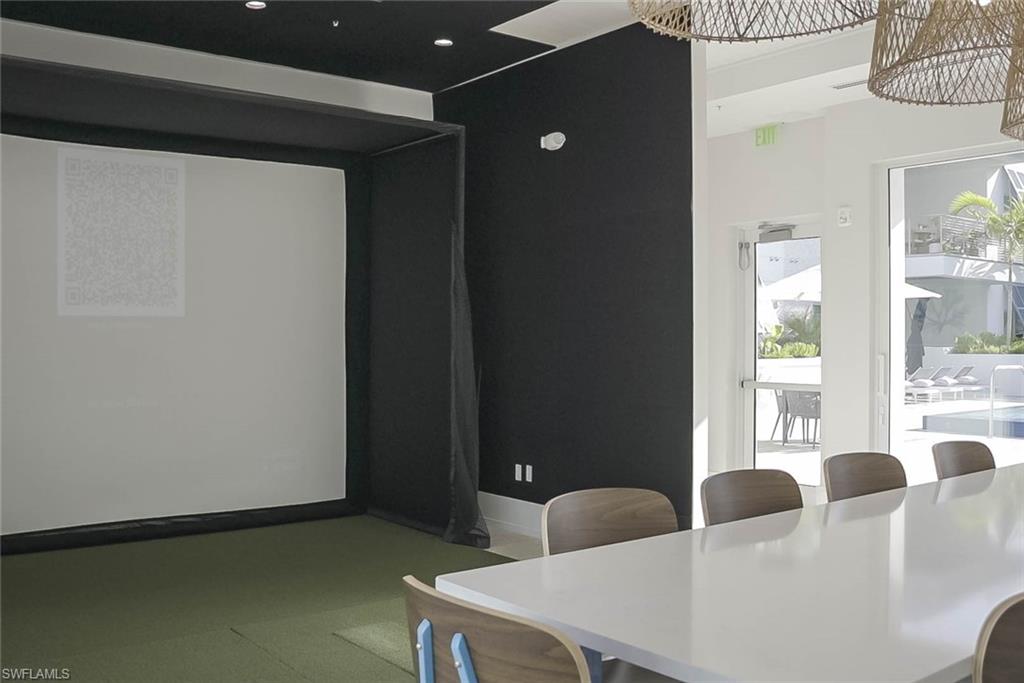 Golf simulator in community room with bathrooms, and sauna - all on the 2nd level -just steps from the patio of unit #208