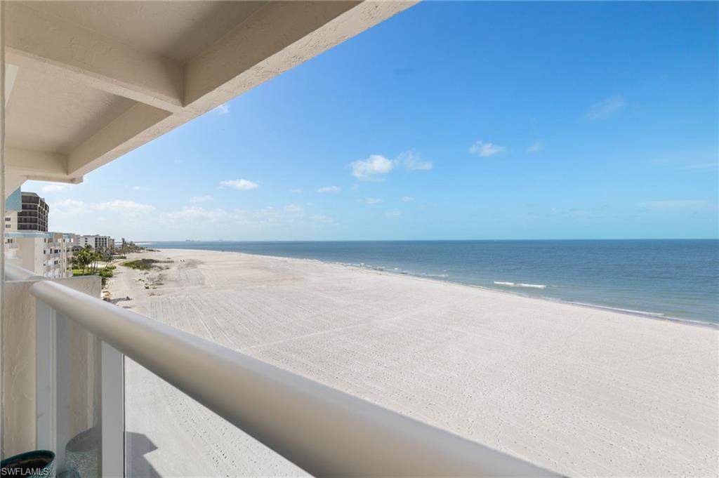 Expansive balcony offering direct ocean and beach frontage