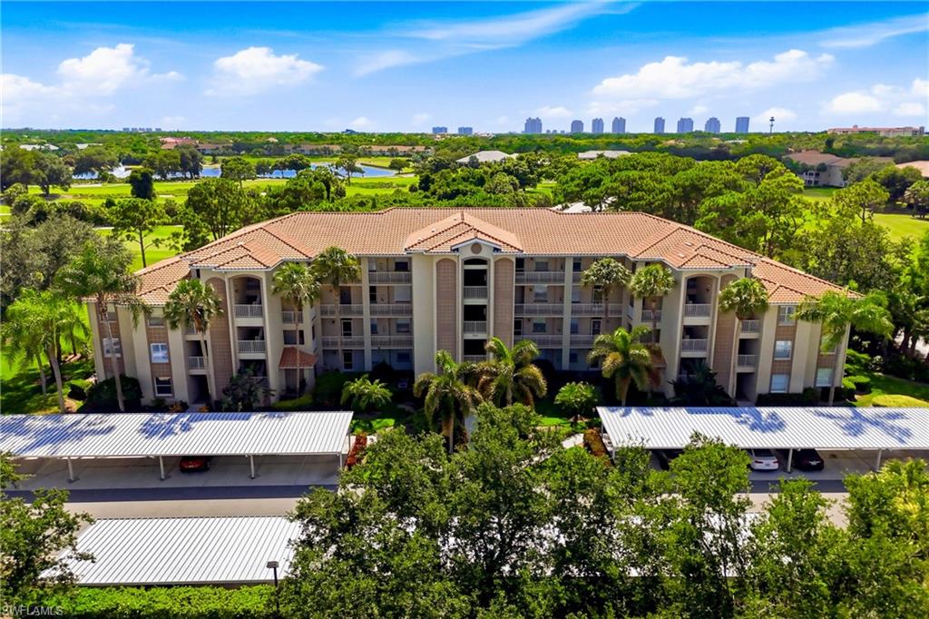 Aerial view captures the essence of Southwest Florida living with expansive fairways, tropical scenery, and an active resort lifestyle.