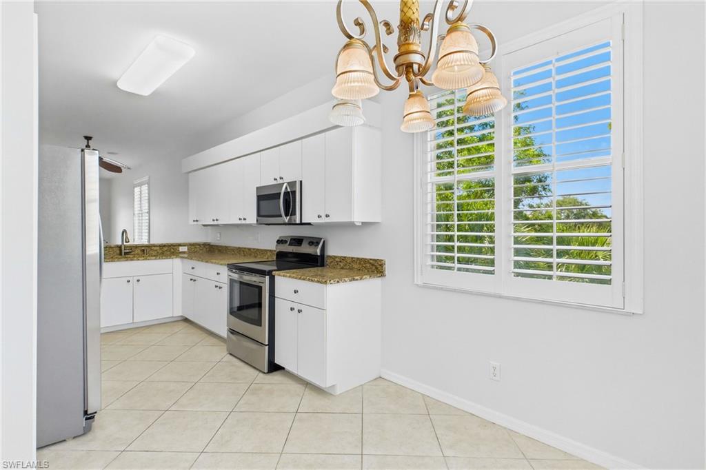 Conveniently situated adjacent to the kitchen, the breakfast area provides the ideal setting for casual dining while maintaining an open and airy feel.