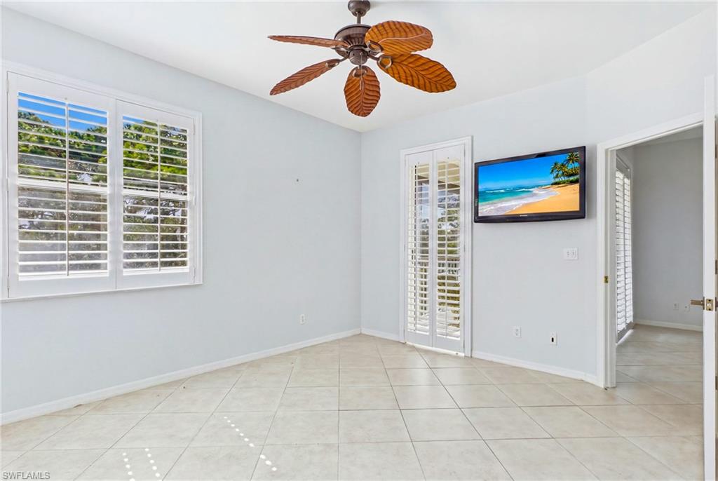 The generously sized primary bedroom offers abundant natural light and plenty of room to create your own private sanctuary.