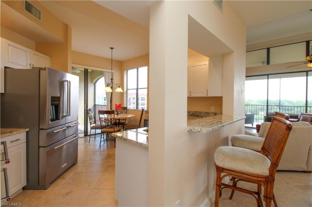 7024 Pelican Bay BLVD F-504 photo 40