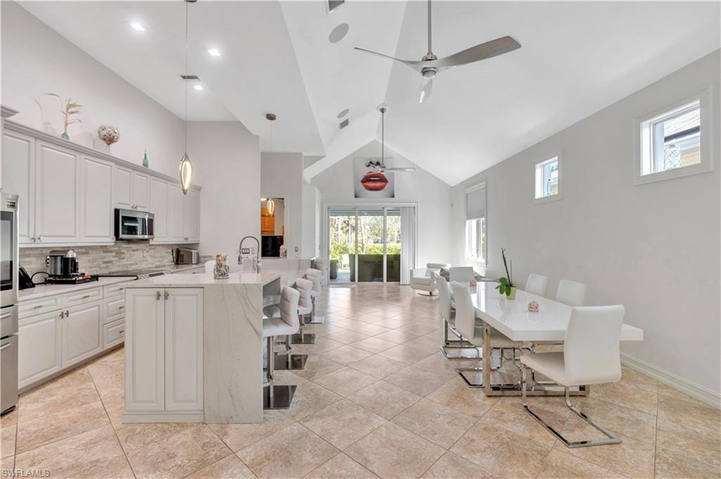 Open-concept living space with vaulted ceilings