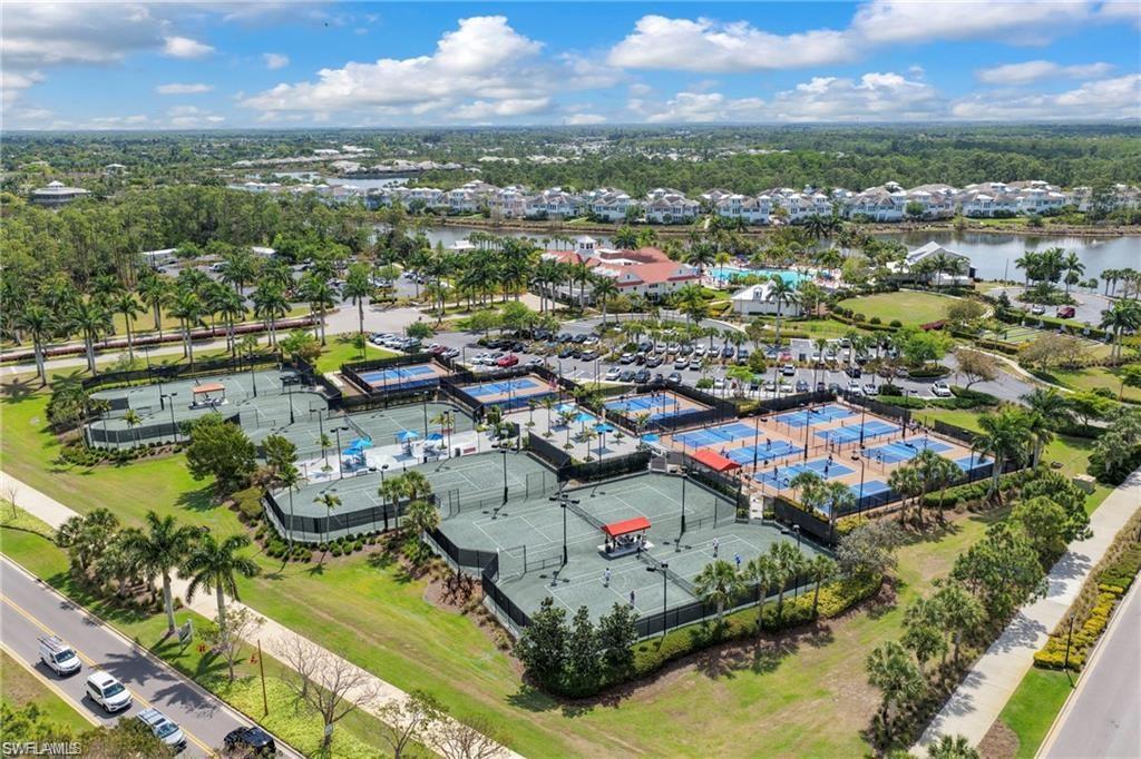 Expansive recreation complex featuring multiple tennis courts and numerous pickleball courts