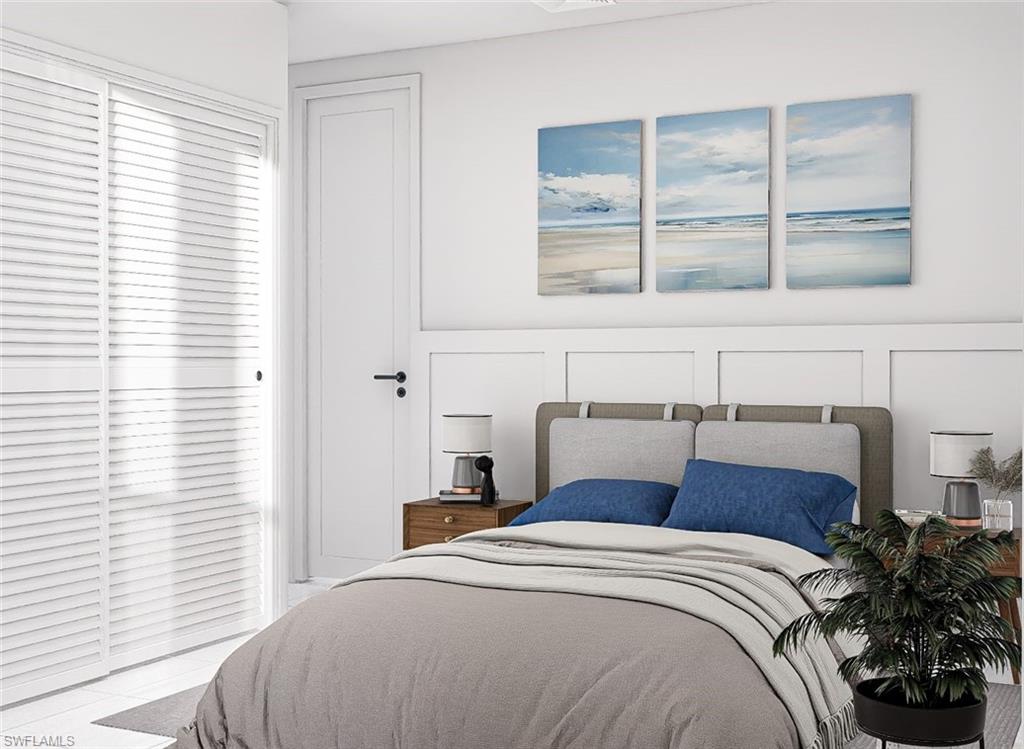 Bedroom with a decorative wall