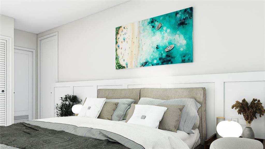 Bedroom featuring a decorative wall