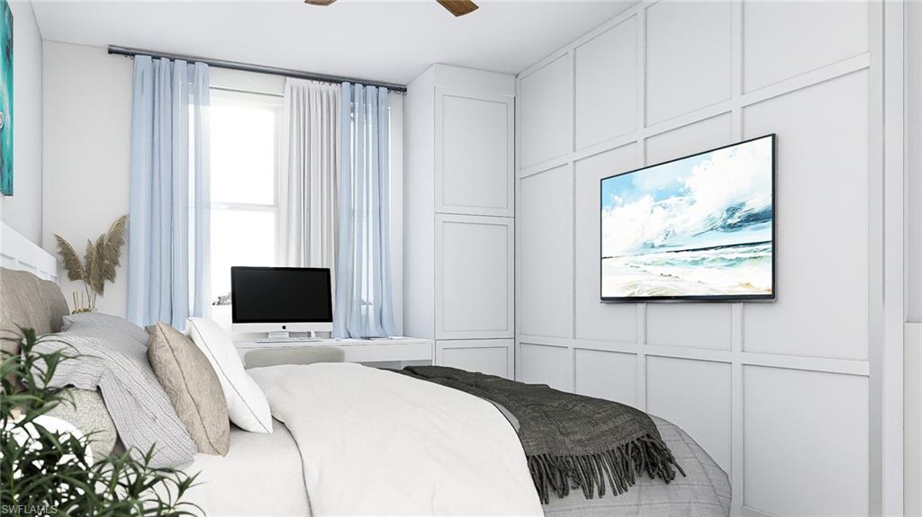 Bedroom with a decorative wall and a ceiling fan