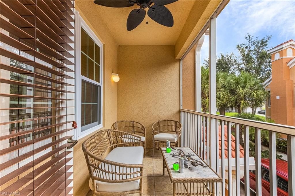Balcony featuring ceiling fan