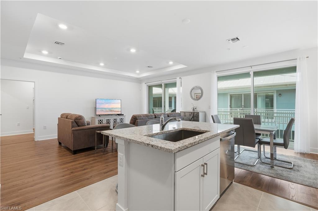 The living and dining area opens to a private lanai.