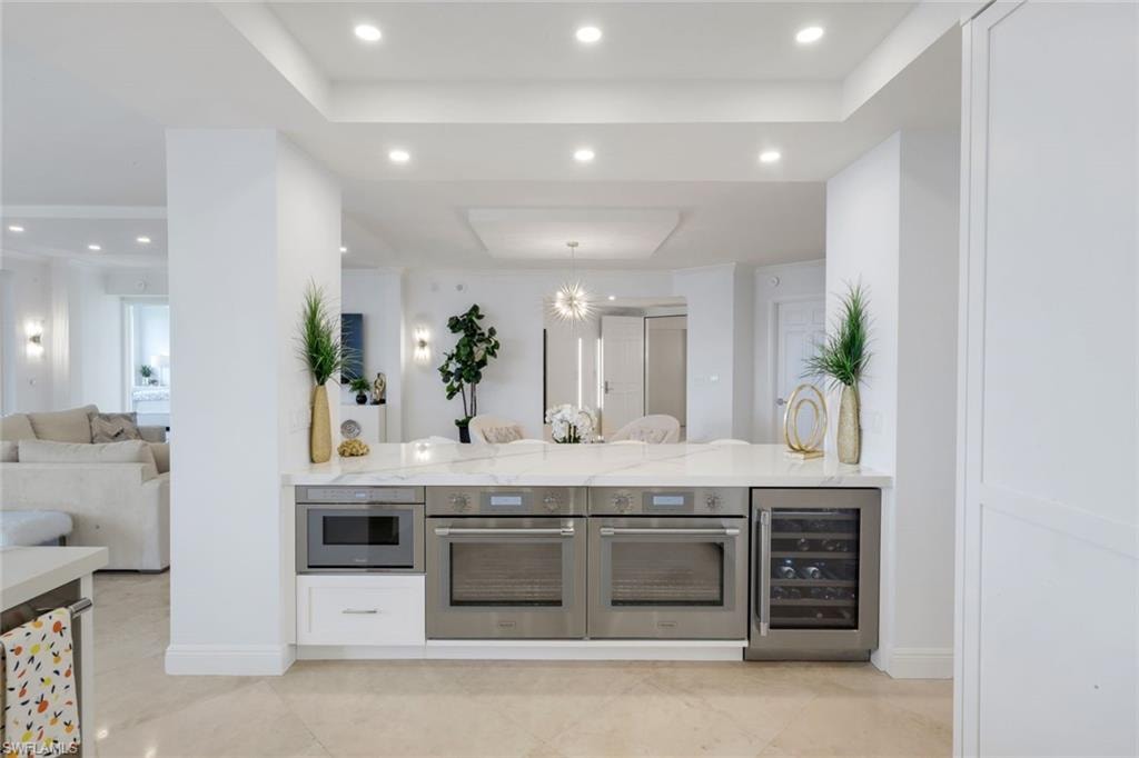 Double Ovens and Beverage Cooler on Island