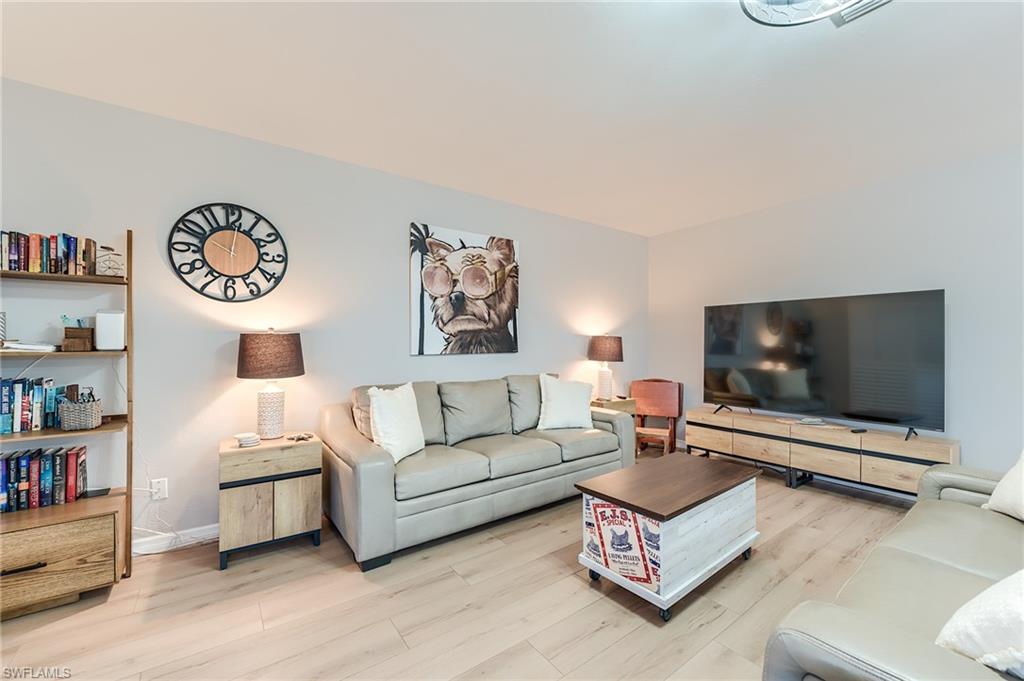 2nd Level Living area with light wood-style flooring- Virtually Edited Image