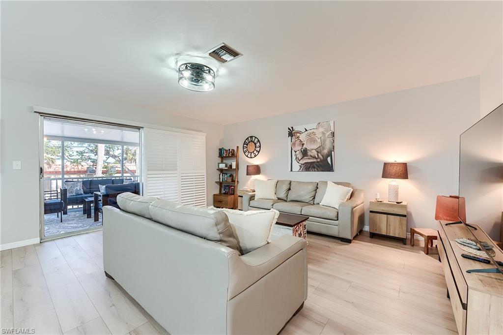 2nd Level Living area featuring light wood-type flooring and baseboards- Virtually Edited Image