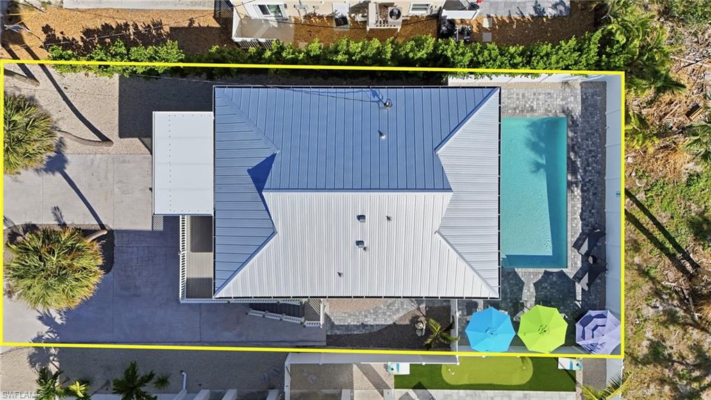 Aerial overview of property's location featuring property boundaries highlighted- Virtually Edited Image