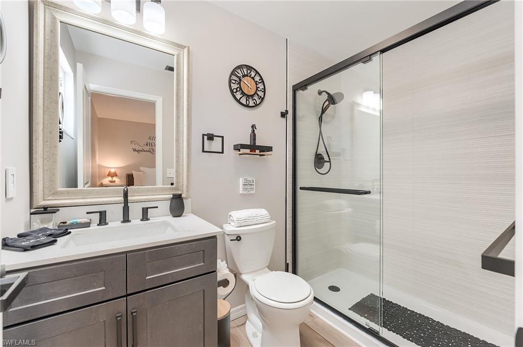 2nd Level Primary Ensuite Bathroom with vanity and a stall shower- Virtually Edited Image