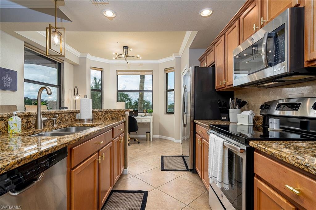 Kitchen with full appliance suite and lake view
