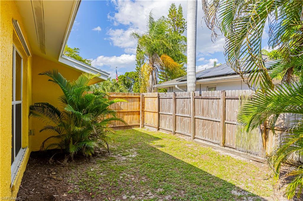 Fenced backyard, great area for parking boat or toys