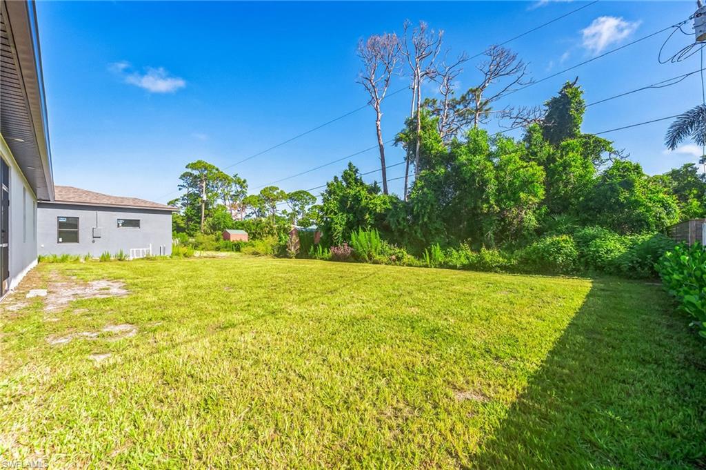 Expansive grass lawn offering significant outdoor space