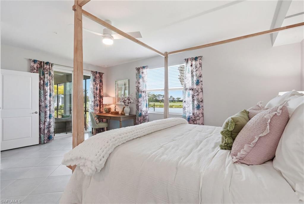 Room with light-toned tiled flooring and white walls