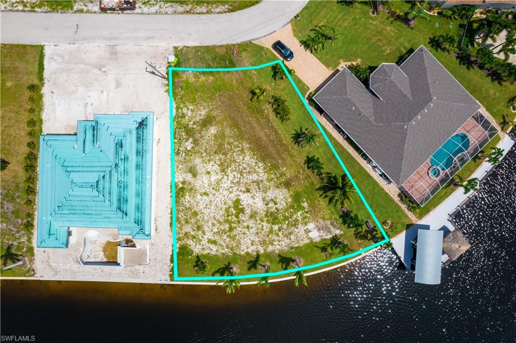 OVERSIZE SOUTHERN rear Exposure Gulf Access lot with NEW (12/2021) 121' SEAWALL - BIG WATER VIEWS