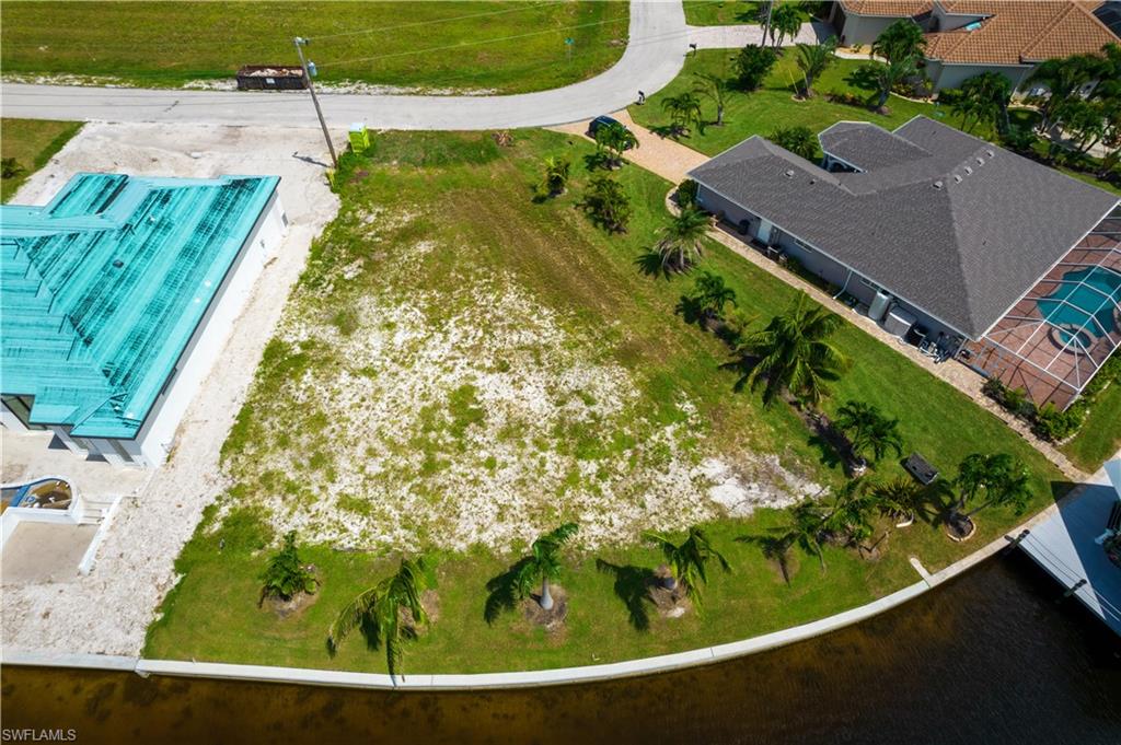 OVERSIZE SOUTHERN rear Exposure Gulf Access lot with NEW (12/2021) 121' SEAWALL - BIG WATER VIEWS