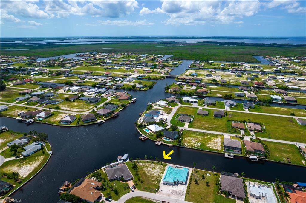 OVERSIZE SOUTHERN rear Exposure Gulf Access lot with NEW (12/2021) 121' SEAWALL - BIG WATER VIEWS