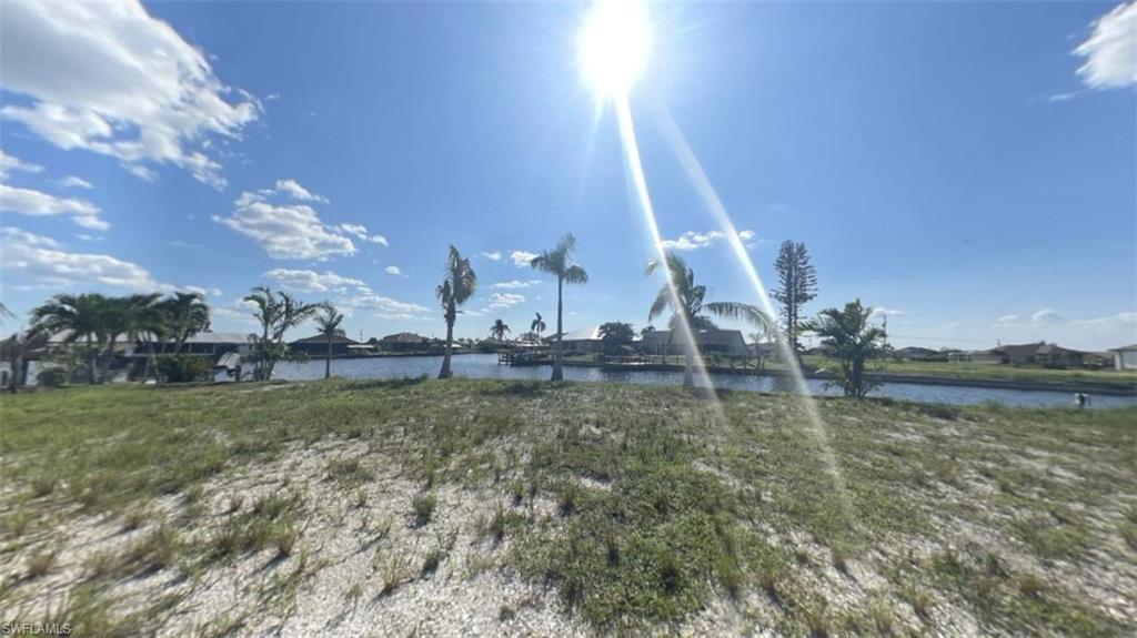 Middle of lot photo - OVERSIZE SOUTHERN rear Exposure Gulf Access lot with NEW (12/2021) 121' SEAWALL - BIG WATER VIEWS