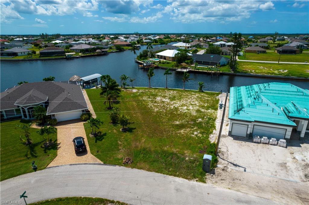 OVERSIZE SOUTHERN rear Exposure Gulf Access lot with NEW (12/2021) 121' SEAWALL - BIG WATER VIEWS