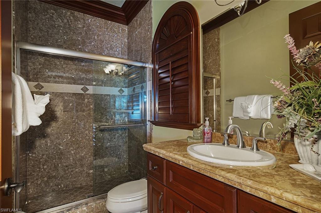 Guest bathroom with glass walk in shower